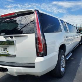 Limo Scene stretch white SUV limo