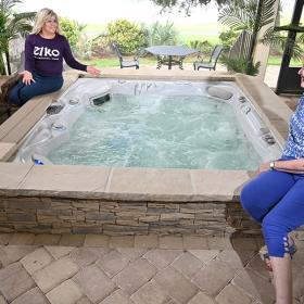 Elko spa with ladies sitting around it