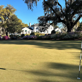 Heritage Golf view of tee with club house in background