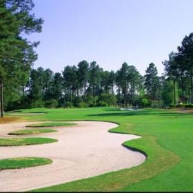 Southcreek fairway with large sandtrap and trees on left