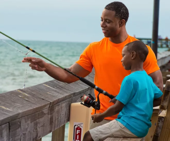 Dad and Son Pier Fishing