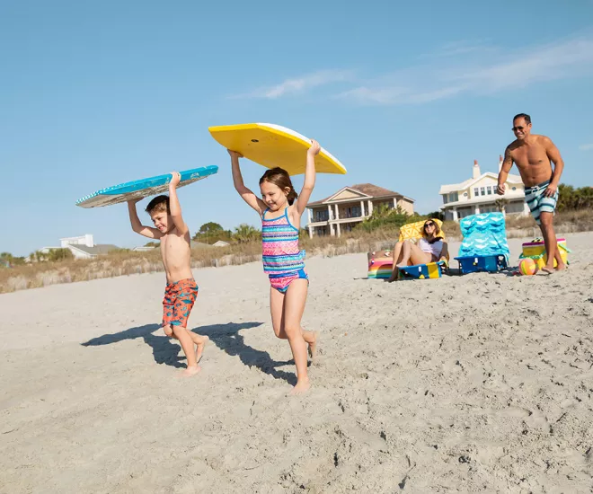 Family with boogie boards