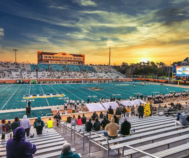Football Bowl Game at sunset