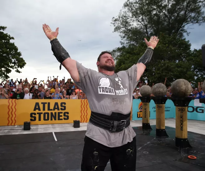 Man in the Worlds Strongest Man competition victorious