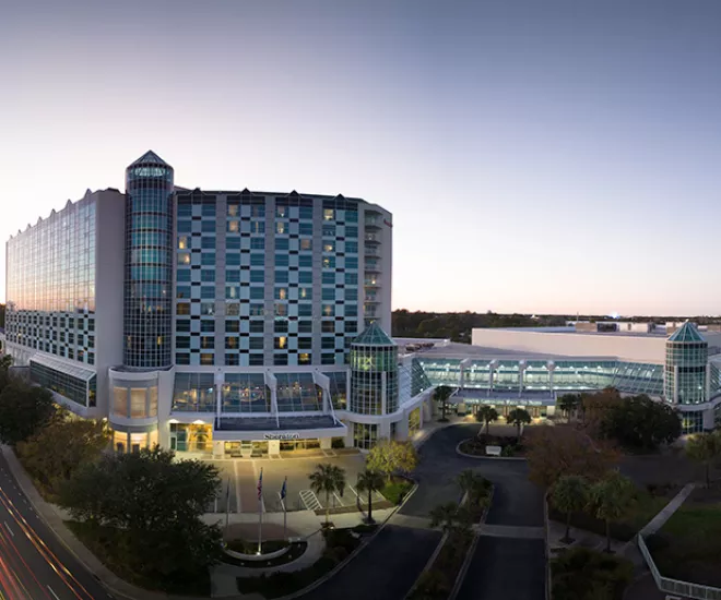 Myrtle Beach Convention Center at dusk with interior lights