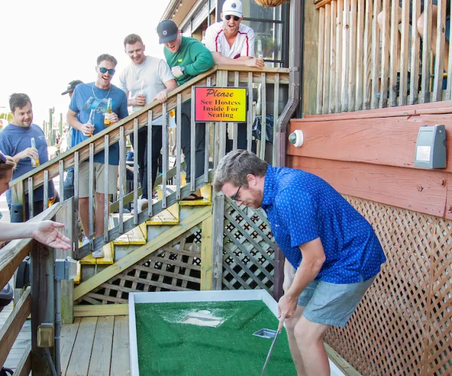 Man golfing at Marshwalk Masters Event in Murrells Inlet