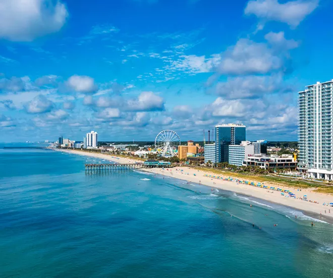 Shoreline with SkyWheel and blue ocean