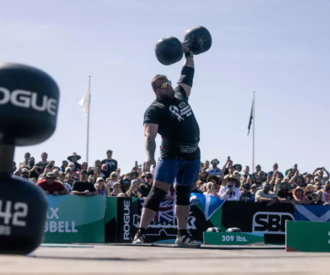 World's Strongest Man competitor lifting 342 lb. barbell