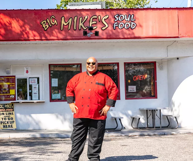 Mike Chestnut in front of Big Mike's Soul Food