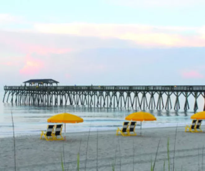 MB State Park Pier with yellow chairs on beach