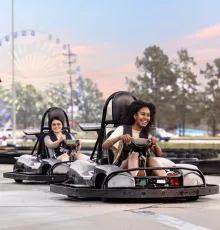 Students Riding Go-Karts at Broadway Grand Prix