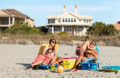 Family sitting on the beach