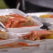 I Love Seafood Fest crab legs and corn on the cob in to go trays