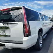 Limo Scene stretch white SUV limo
