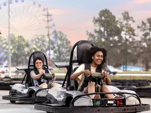 Students Riding Go-Karts at Broadway Grand Prix