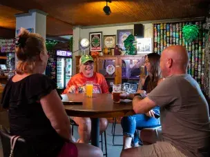 Friends having a beer at New South Brewing