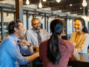 Meeting professionals having cocktails at restaurant