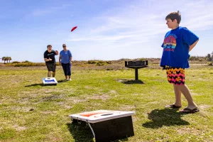 Sensory-Friendly Travel: Cornhole at Myrtle Beach State Park