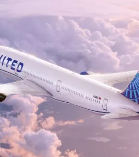 United Airlines plan flying through clouds