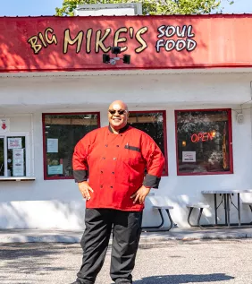 Mike Chestnut in front of Big Mike's Soul Food
