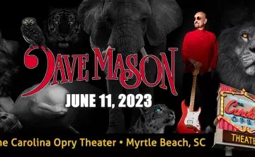 Dave Mason surrounded by endangered species