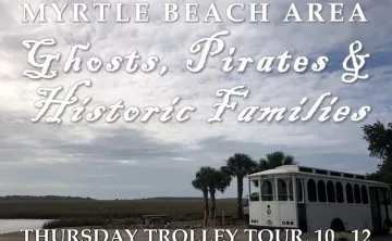 White trolley sitting along the inlet in Murrells Inlet
