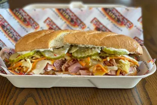 Firehouse sub in a to-go container