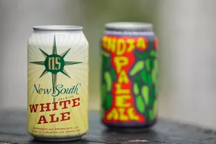 New South cans of White Ale and India Pale Ale