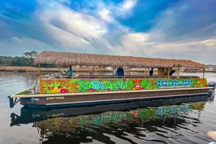 PonTiki Myrtle Beach tour boat with tiki roof and colorful graphics