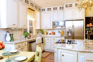 Modern kitchen with island and marble countertops