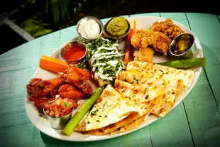 Senor Frog's quesadilla with wings and sauces