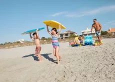 Family with boogie boards