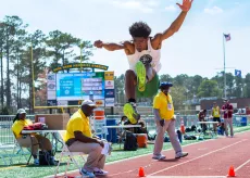 Long Jumping in a Track Meet at The Beach