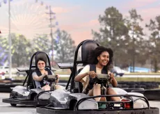 Students Riding Go-Karts at Broadway Grand Prix