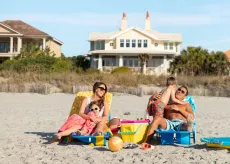Family sitting on the beach