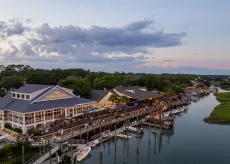 Aerial shot of the MarshWalk with sunset