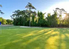 Tradition Golf Club sunrise view of putting green