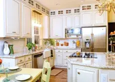 Modern kitchen with island and marble countertops