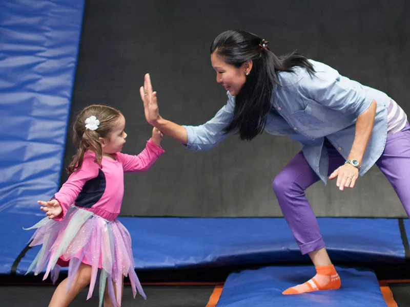 Sky Zone Toddler Time mom and daughter high fiving