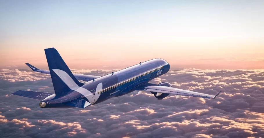 Breeze Airways plane flying over clouds