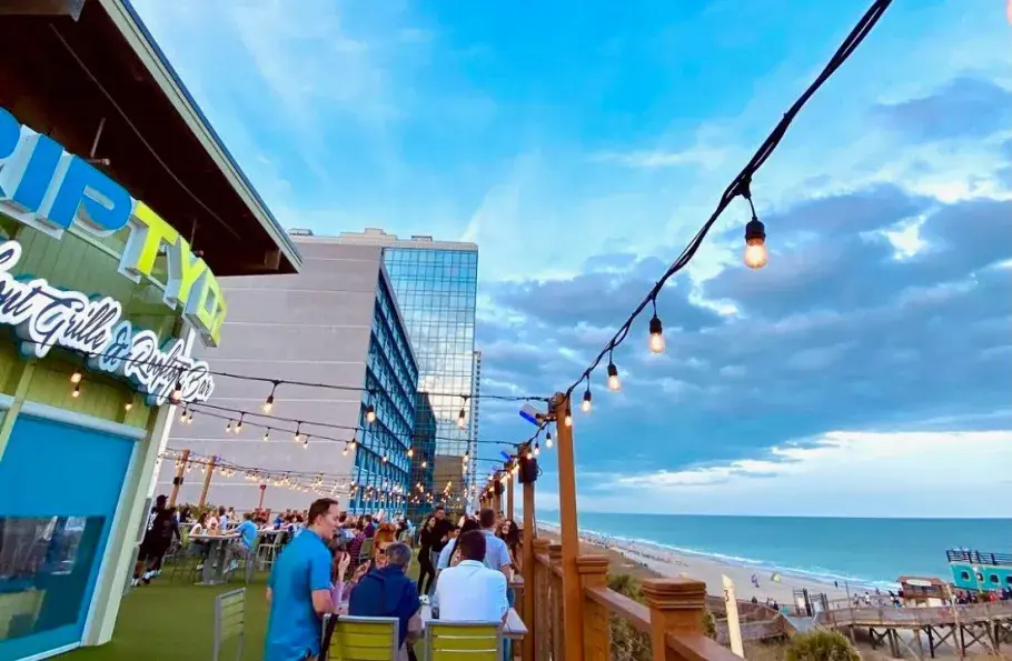 Riptydz oceanfront deck patio at dusk