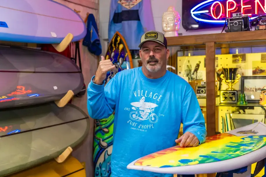 Owner Kelly Richards inside Village Surf Shoppe