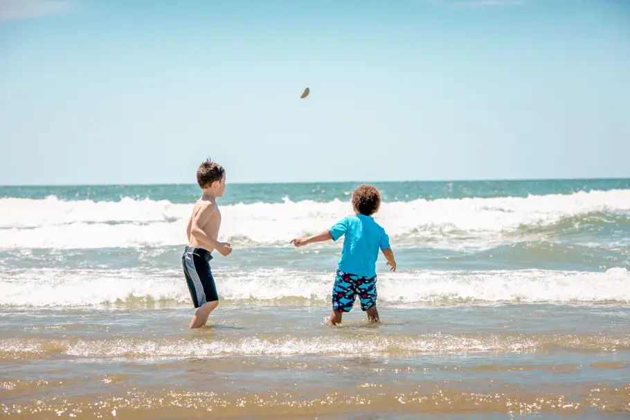 Kids Playing in Ocean