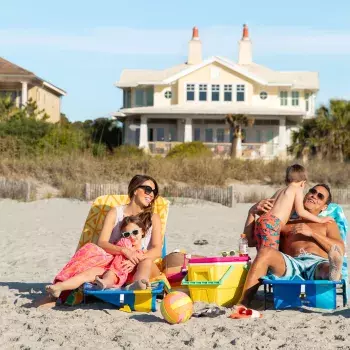 Family sitting on the beach