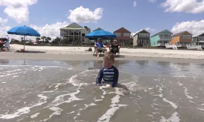 Autistic Child on Beach Thumbnail